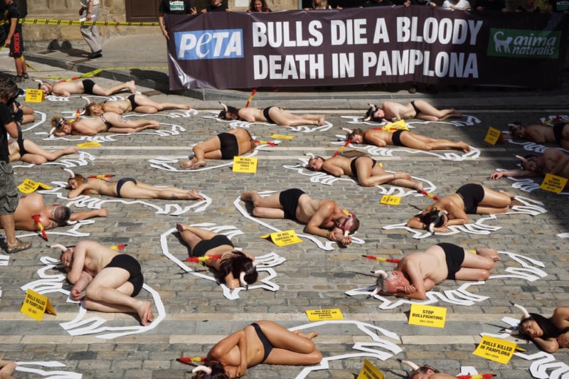 54 protestors staged a “crime scene” cordoned off with yellow tape in Pamplona, Spain in 2019.