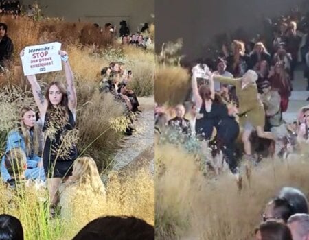 A PETA entity supporter stormed the runway, brandishing a sign that read, “Hermès: Drop Exotic Skins.”