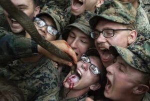 Marines drink blood from a snake at Cobra Gold.